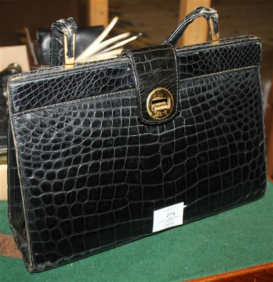 Black animal skin handbag